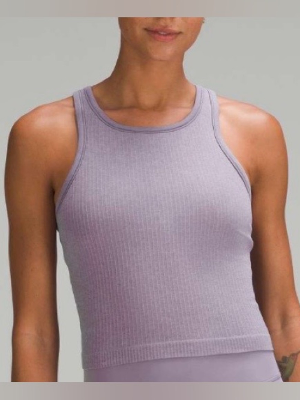 Used Lululemon Ebb to Street Cropped Racerback Tank Top
Purple Ash